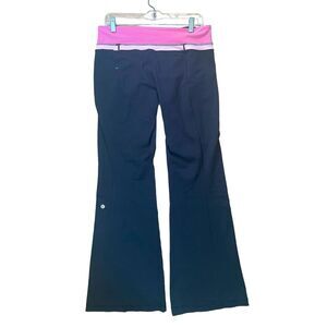 Lululemon women’s groove flare reversible pink black leggings size 10 activewear
